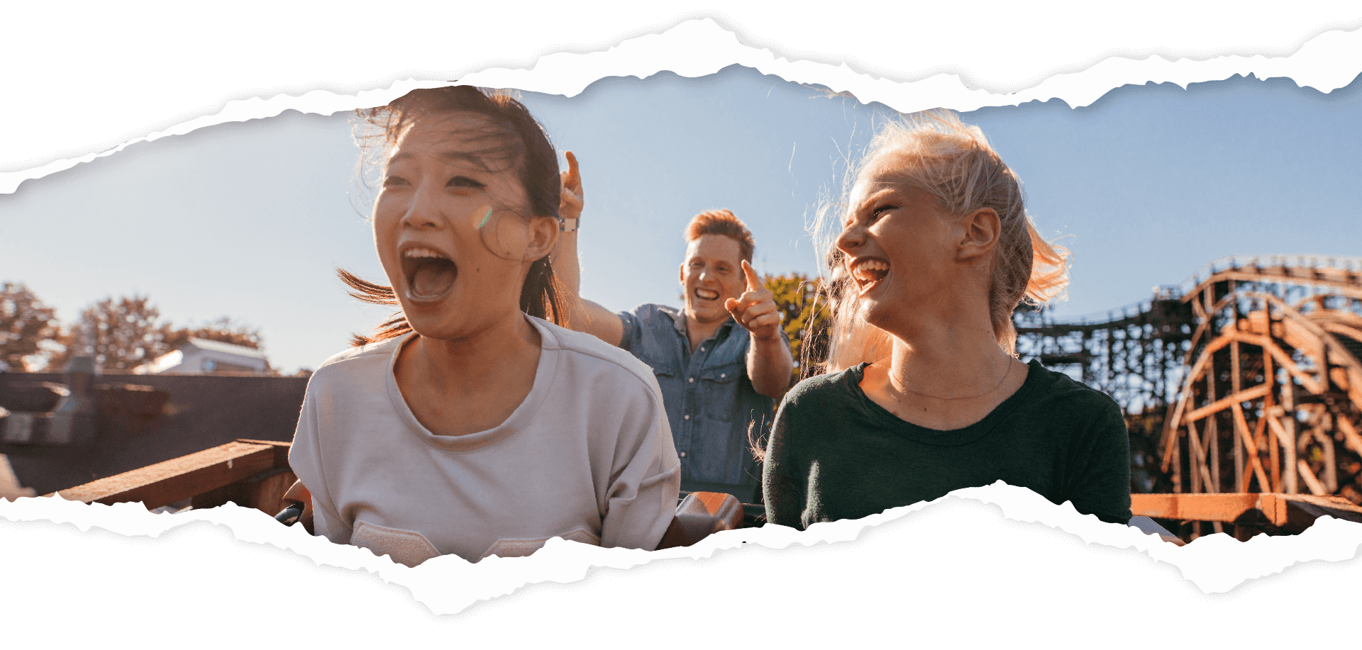 Three people on a rollercoaster