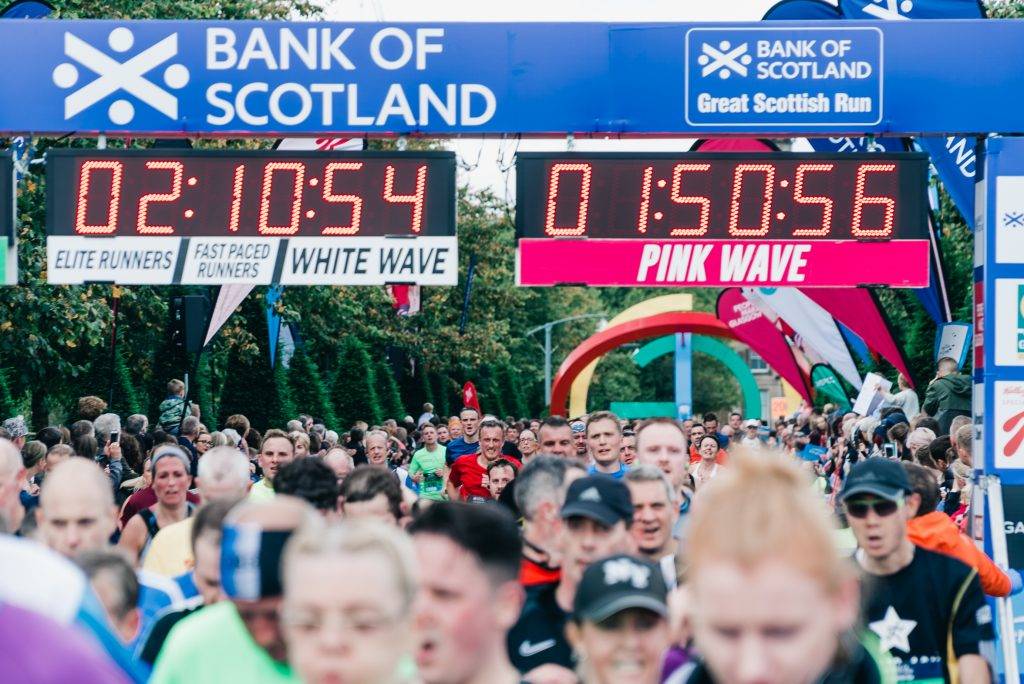 crowd of runners at finish line