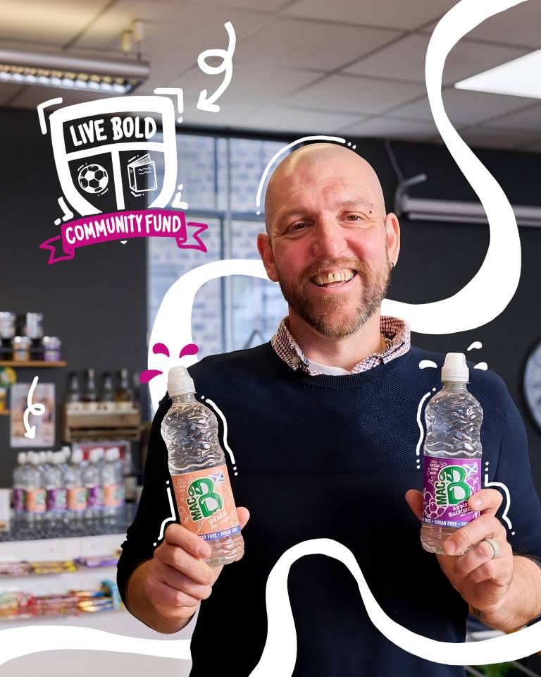 Four Pillars Unity Hub and Cafe recieving macb water to support them in raising additional funds